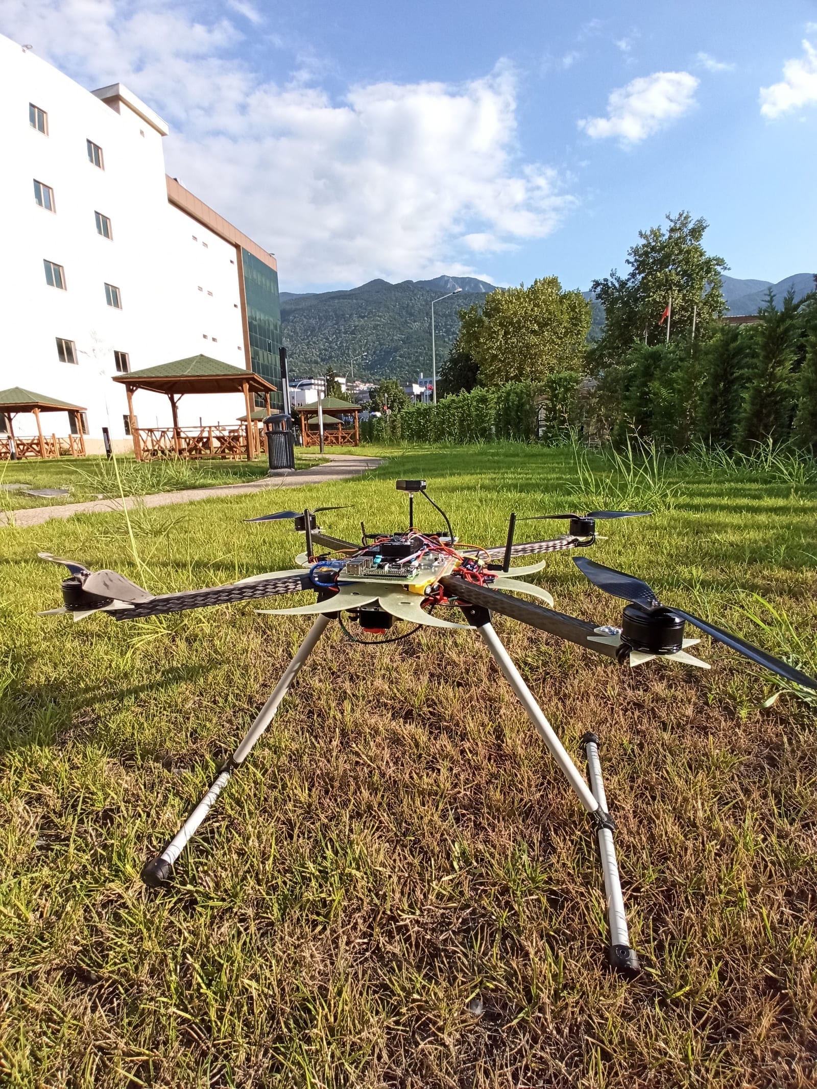 ABRA autonomous fire-fighting UAV on the field — a carbon-frame multirotor